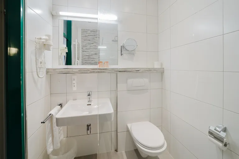 Vanity and WC in the modern bathroom at Motel Baden