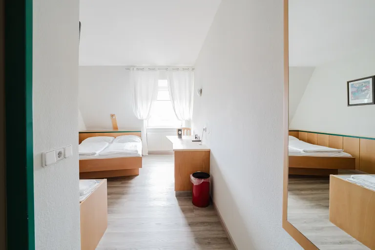 View into an attic double room at Motel Baden