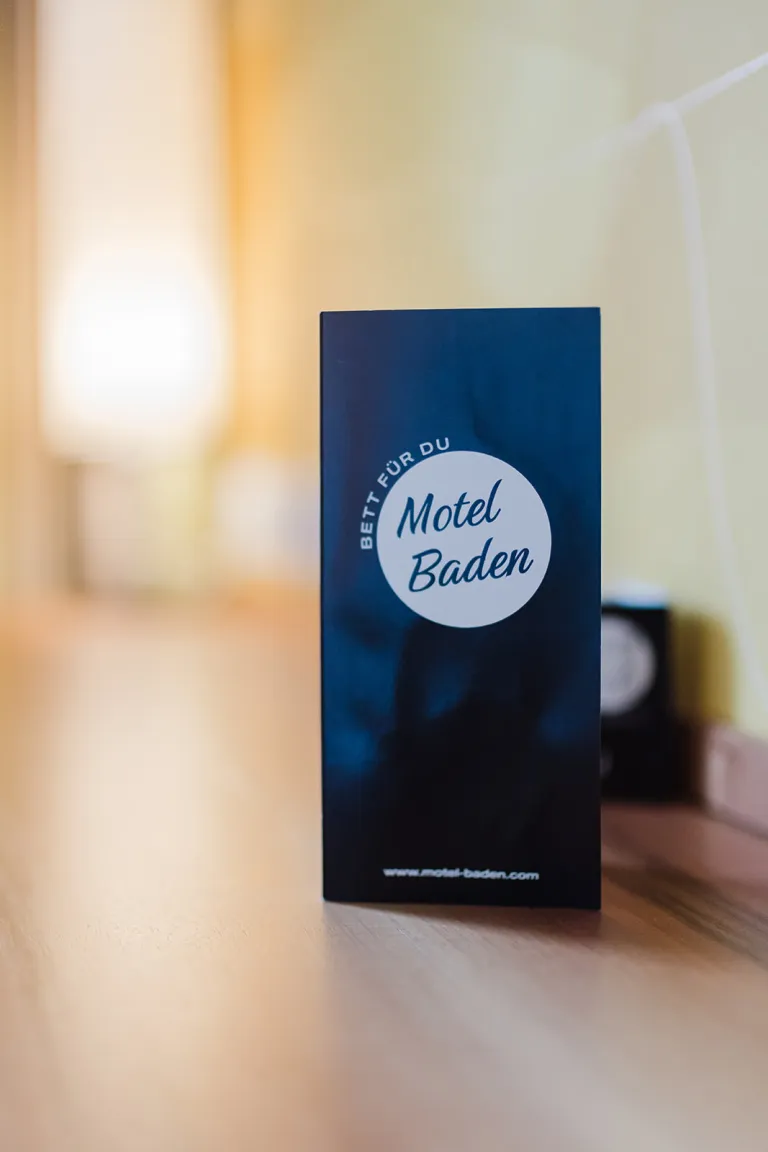Motel Baden flyer in a room