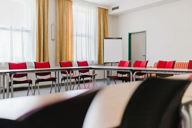 Large seminar room on the 1st floor with flipchart at Motel Baden